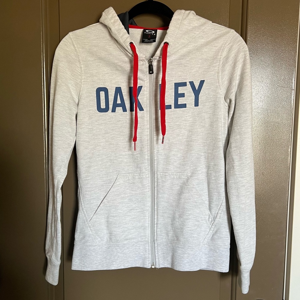 Oakley zip up sweater.